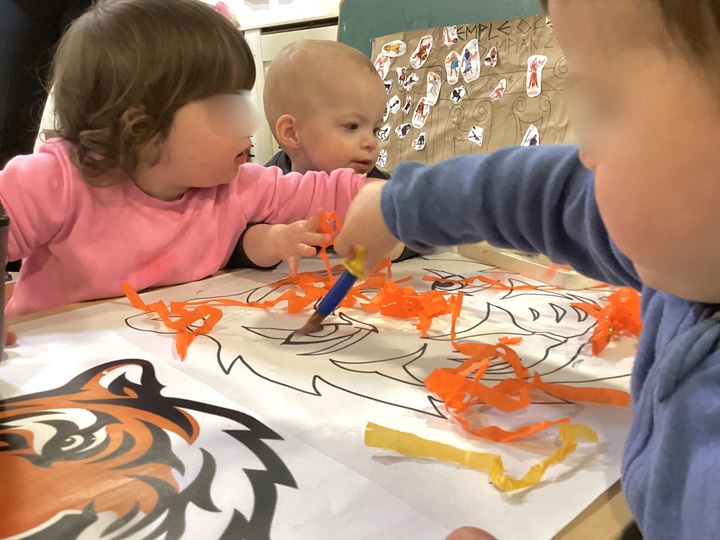 Children doing Bengal Tiger craft as part of Indian cultural activities